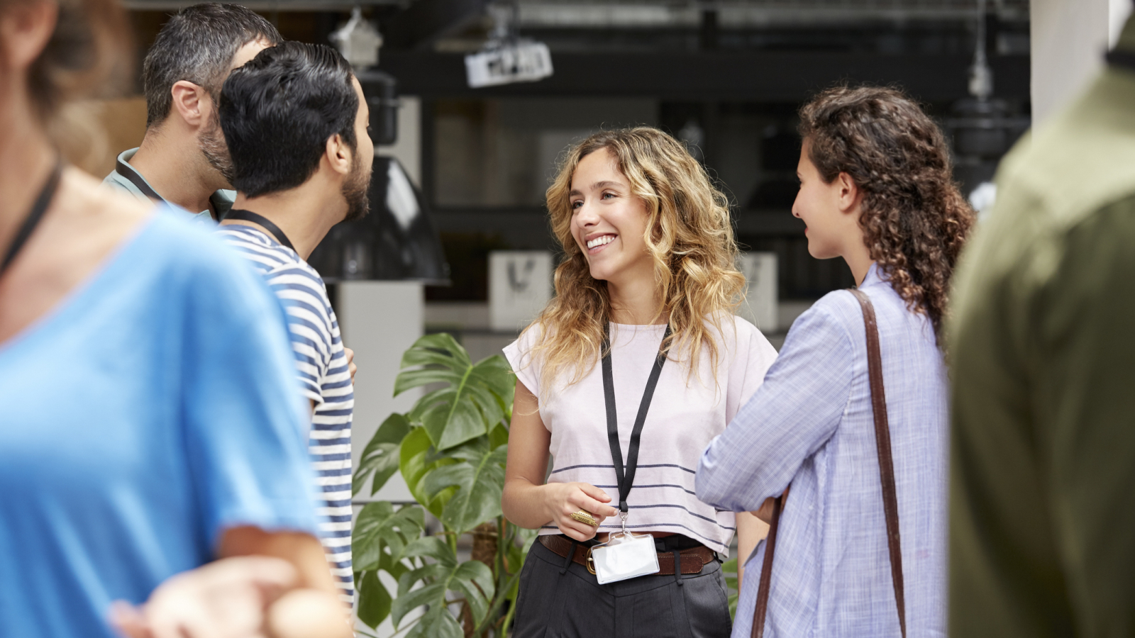 Smiling business team standing during meeting