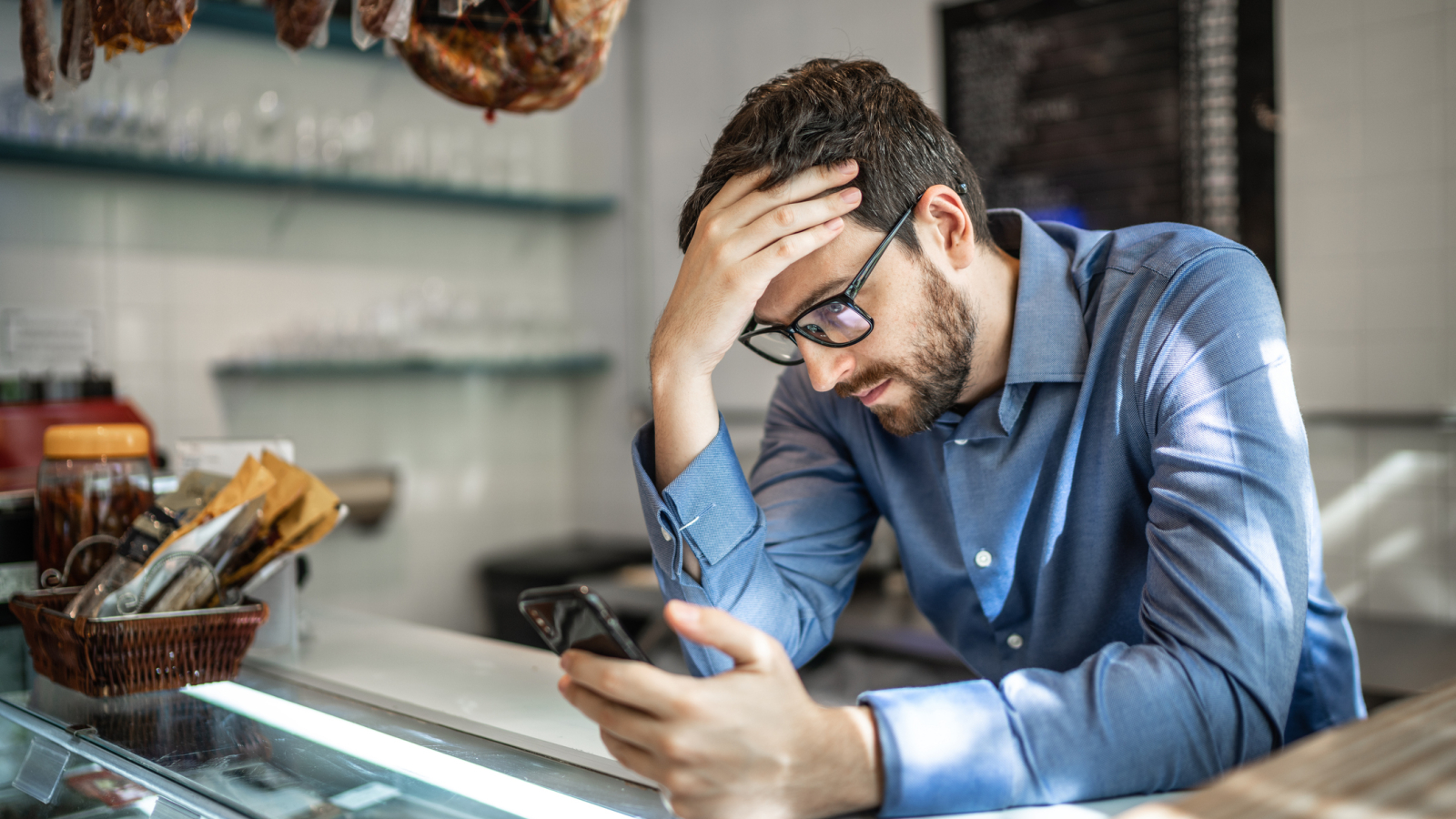 Worried small business owner