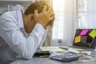 Business people stress the cost