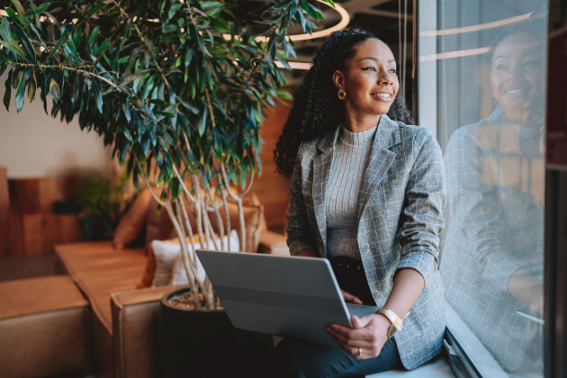 Business woman using laptop
