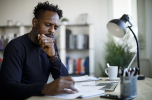Worried man about budget and home finances