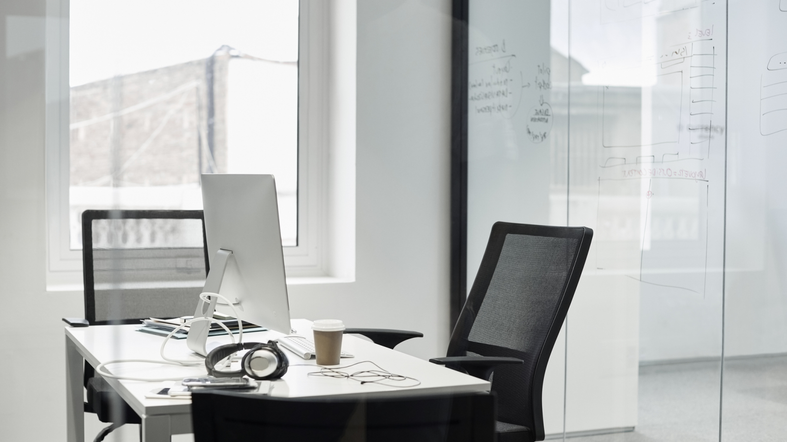 Desktop PC On Desk At Bright Office