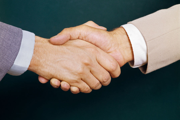 1970s TWO BUSINESS MEN…