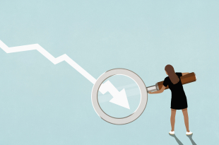 Woman holding magnifying glass over descending chart arrow