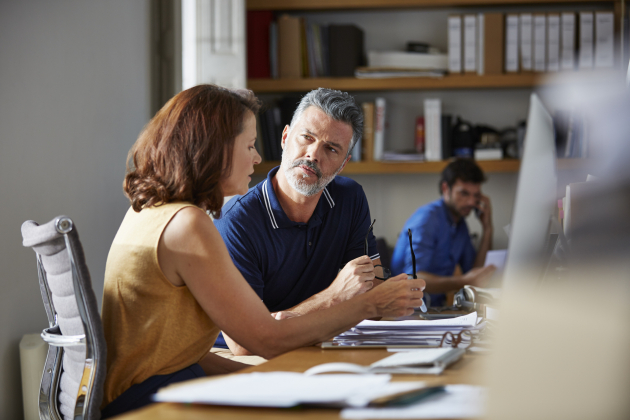 Business people discussing at desk