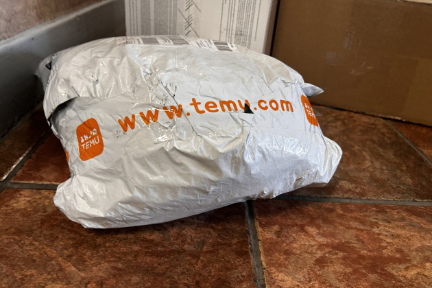 Temu package in apartment building lobby, Temu, which is owned by Chinese parent company PDD Holdings, shopping app Temu.com, Queens, New York