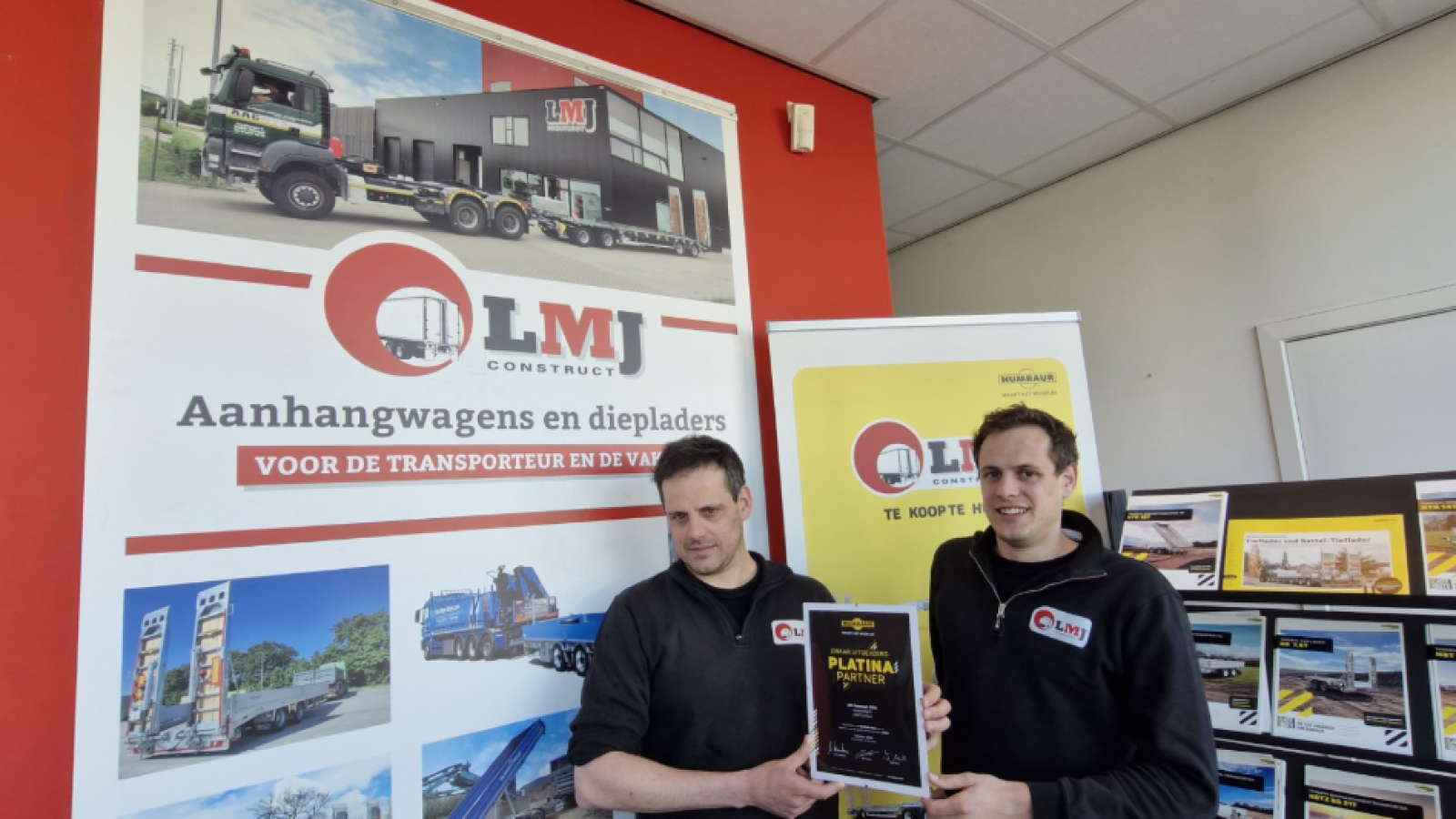 De onderscheiding beloont de samenwerking tussen beide bedrijven binnen het segment van zwaar transportmaterieel.