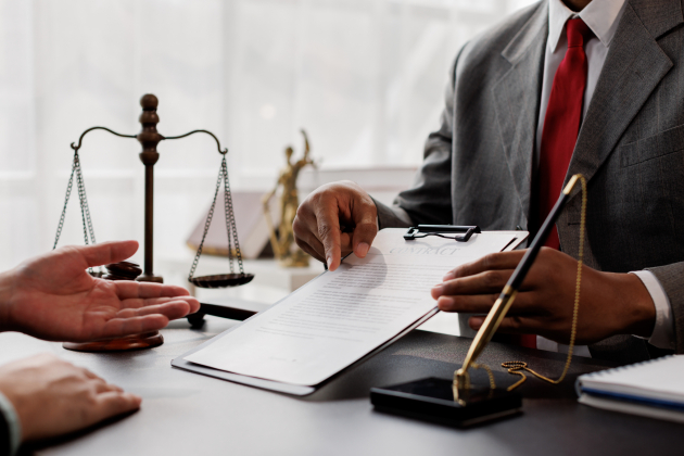 The boss is pointing in the face at the helper who misbehaved in business or legal matters in law firm office. Legal law, advice deal justice and law concept.