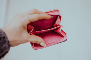 woman hand holding empty wallet