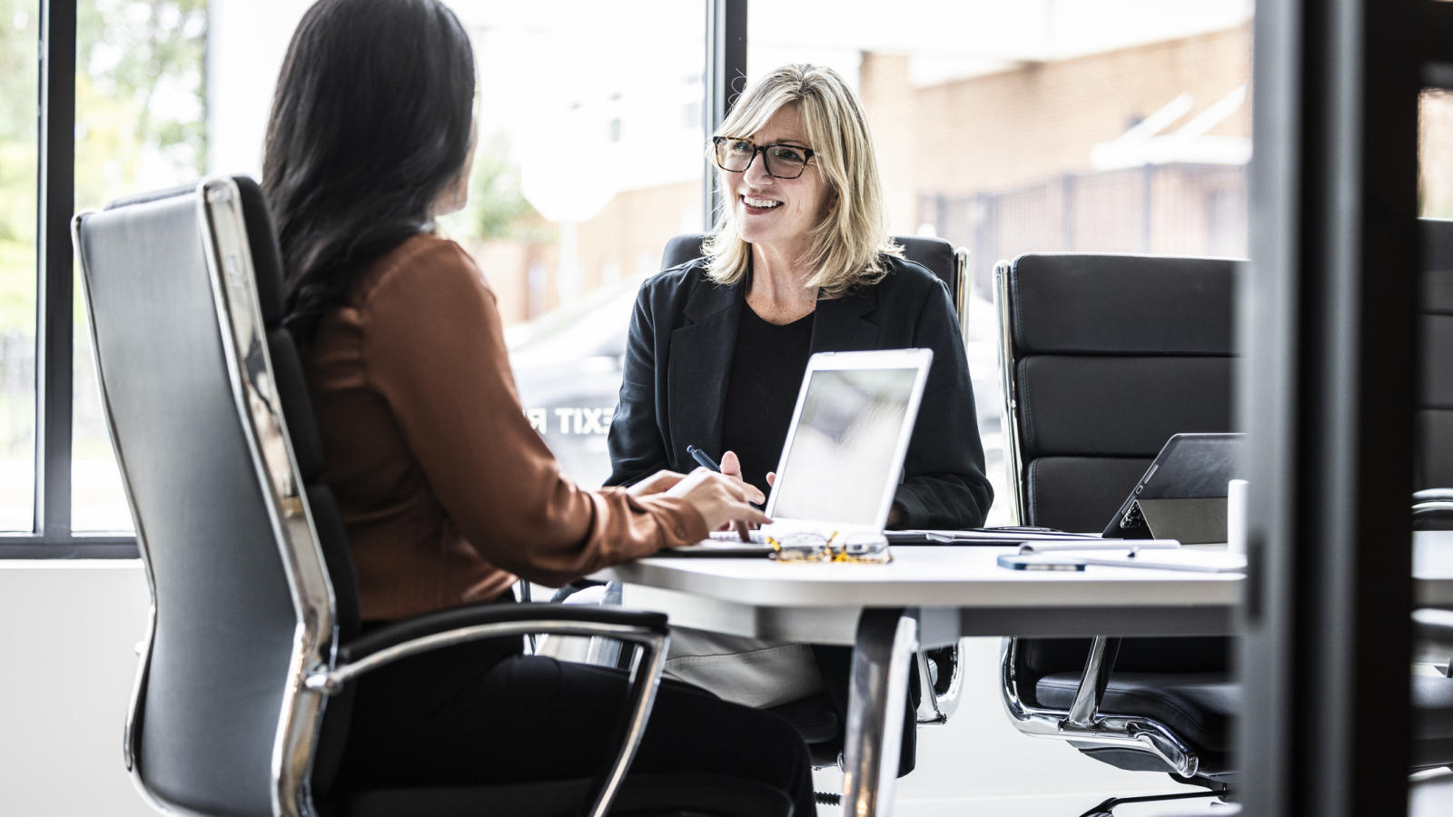 Businesswomen meeting in modern conference room